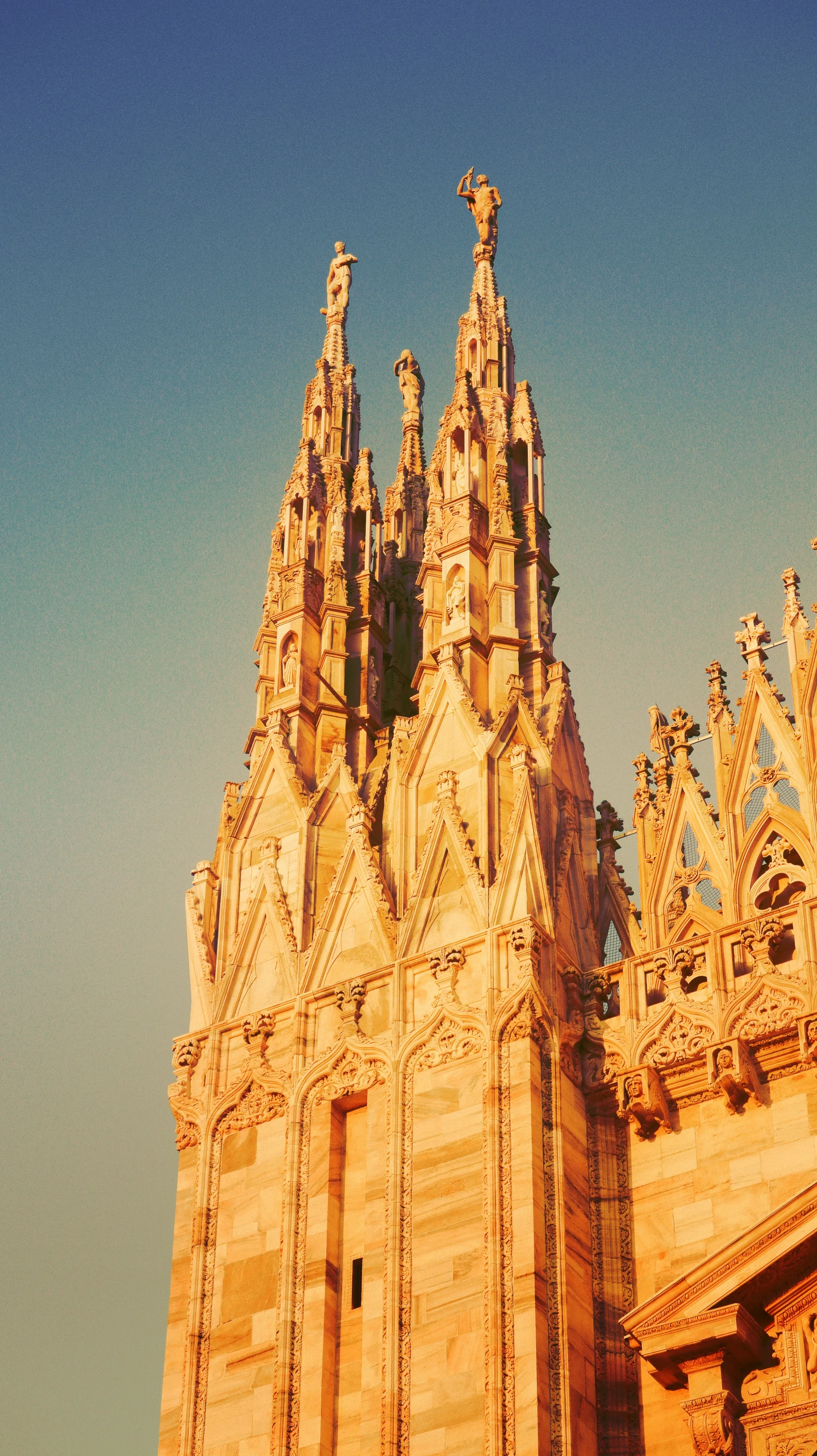 the image shows an old cathedral structure with a clock