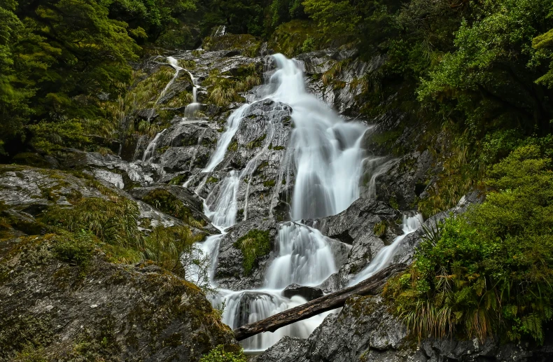 the waterfall is being viewed from below