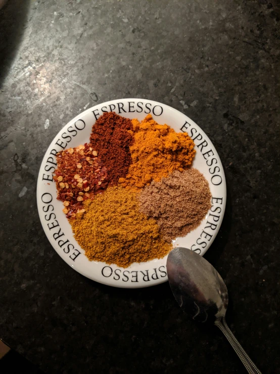 the plate contains several different types of spices