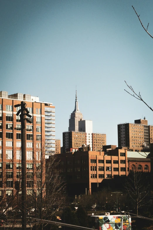 buildings in the background with a blue sky in the background