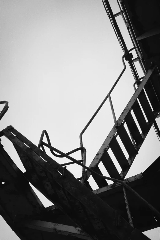 a bird standing on top of an old structure