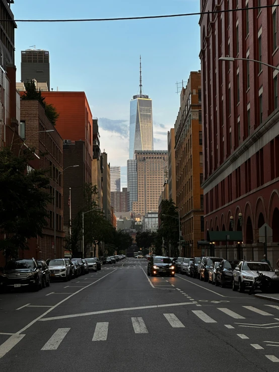 a city street with tall buildings on both sides