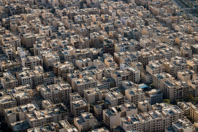 many apartment buildings are visible from above in a city