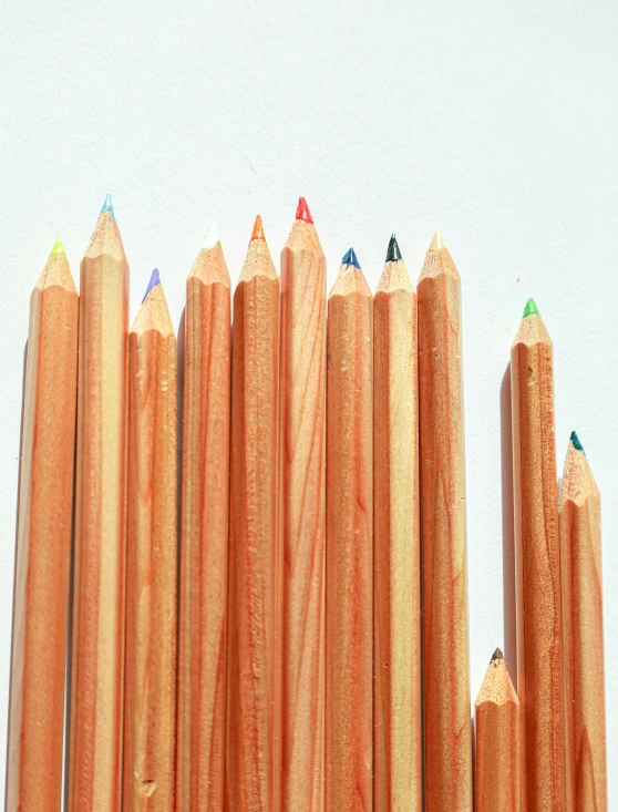 a bunch of pencils sitting on top of each other