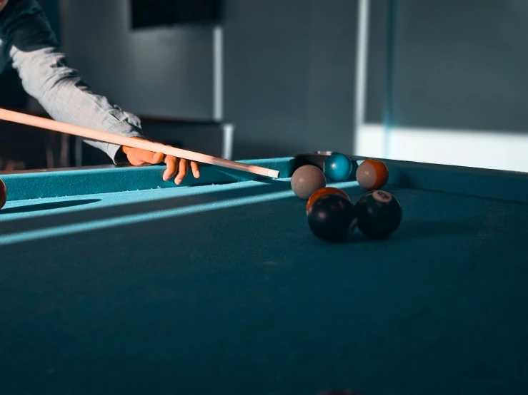 a pool table with several billiards on top