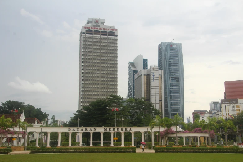 a park and city in the background with tall buildings