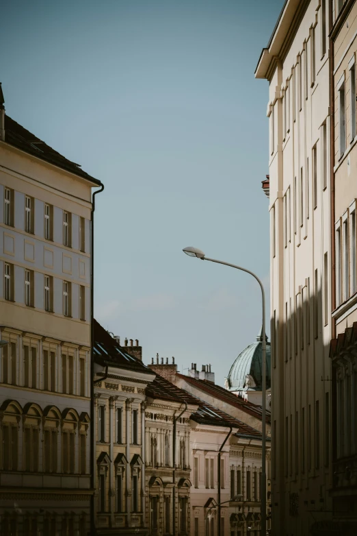 a view of a street light in a city