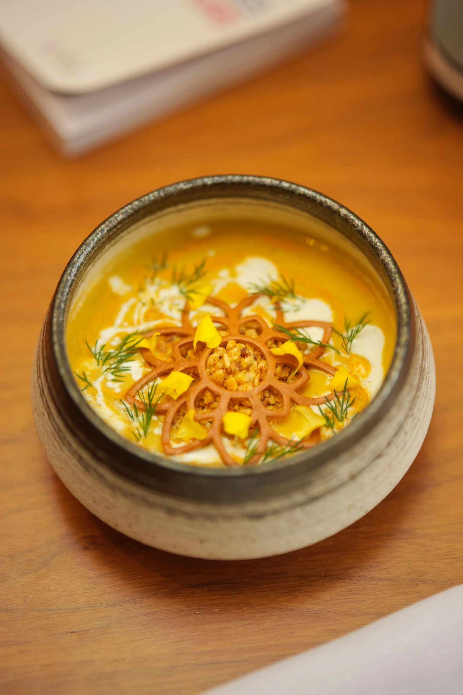 a bowl that has been filled with a creamy looking soup