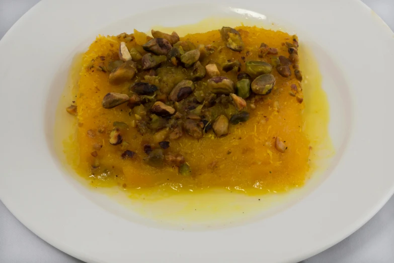 a close up of a plate of food with bread and ding