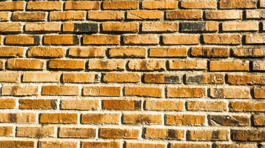 a wall made of red brick, like the back of a wall