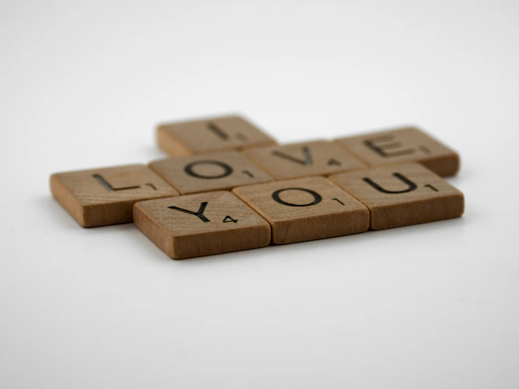 a scrabbled word written on a white surface