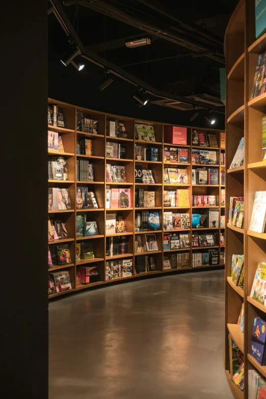 a large bookshelf with books lined up