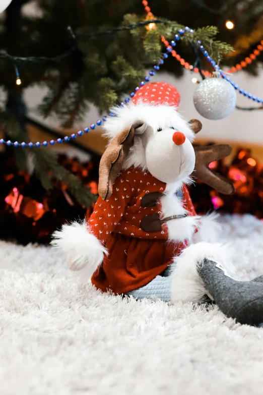 a little stuffed animal wearing a santa hat