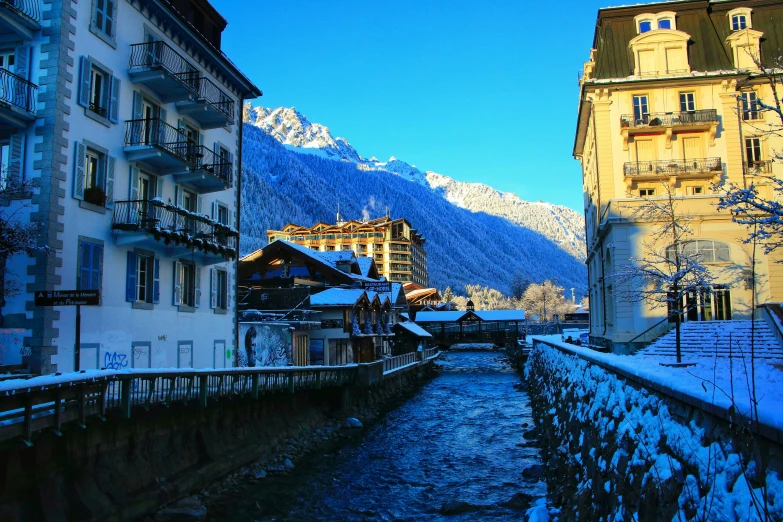 a long river in the middle of some town