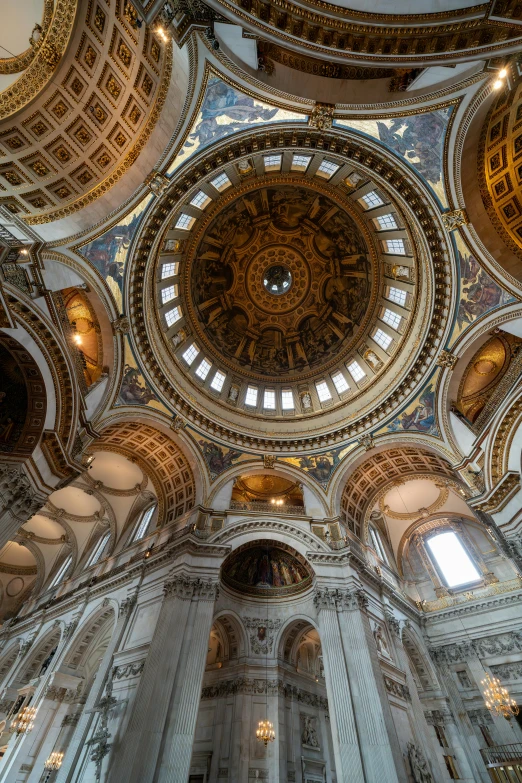 the ceiling of an old building with circular ceilings