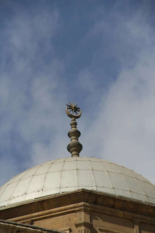 an ornate dome on the top of an building