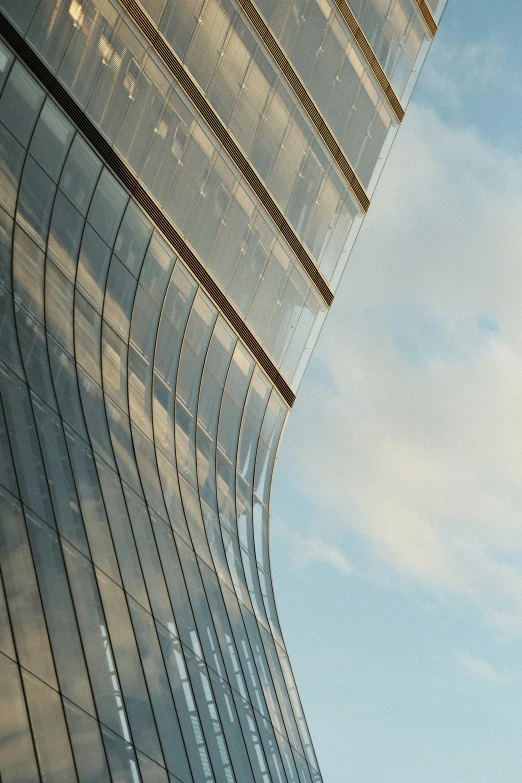 a bird sitting on a building next to the window