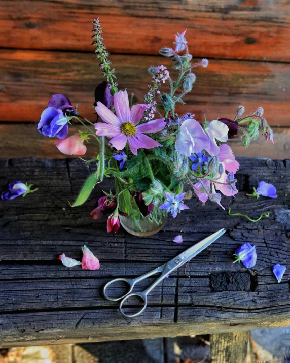 the flowers are in a vase on the table