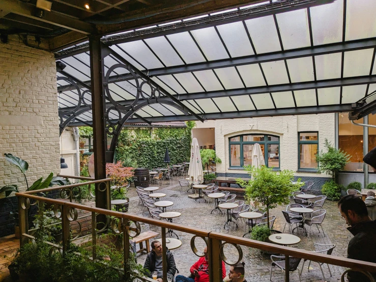 an outside cafe with an open door to the courtyard