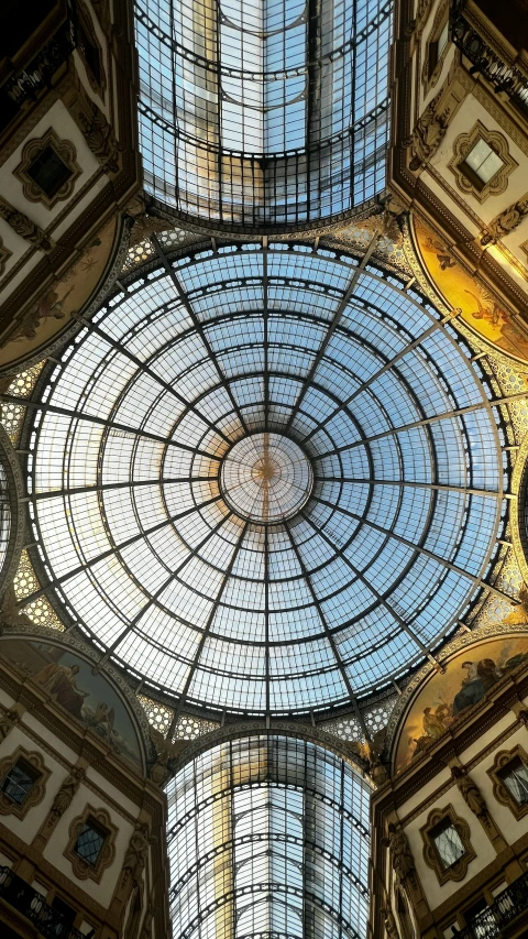 looking up at some interesting glass and iron structure