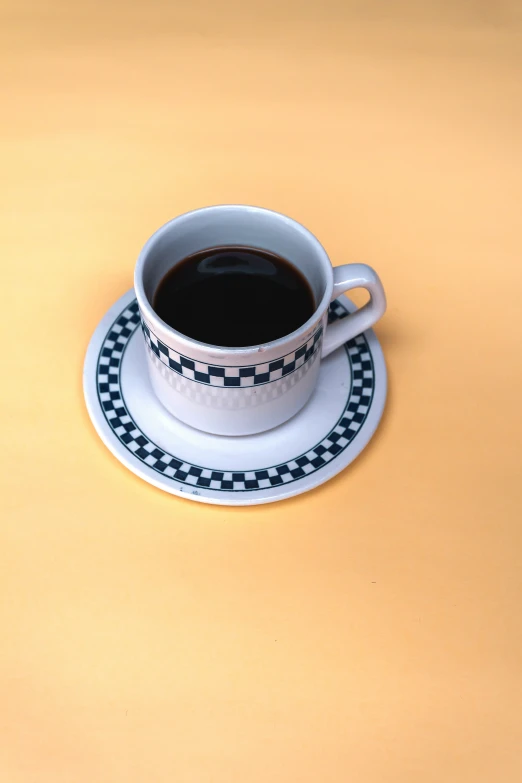 a cup on a saucer with saucers on the side