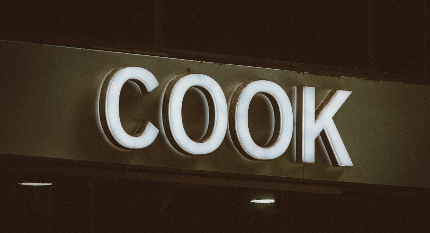 the logo of a new york city bakery is lit up