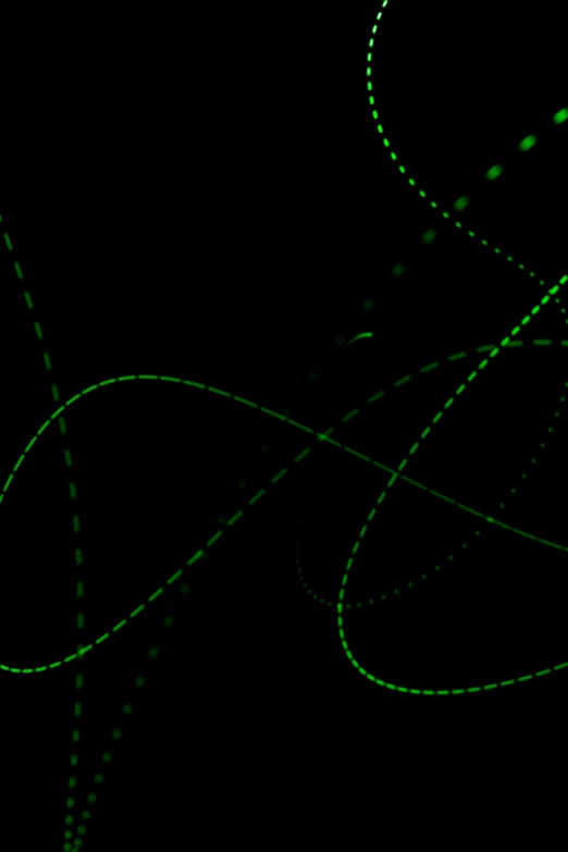 a bright green dotted line going across a black background