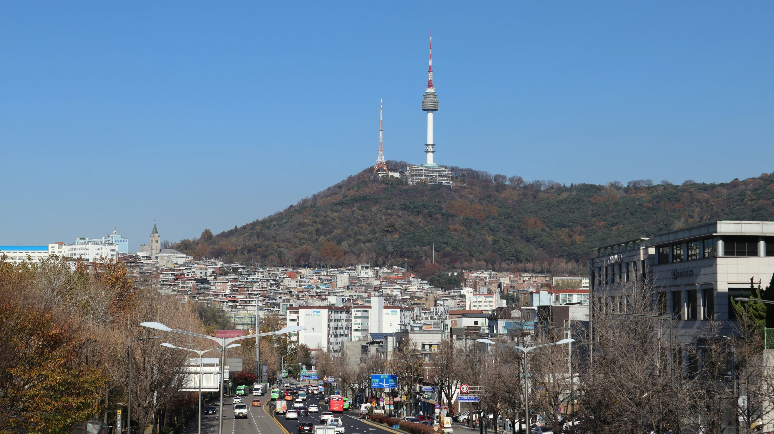 a view of a city with a mountain in the background