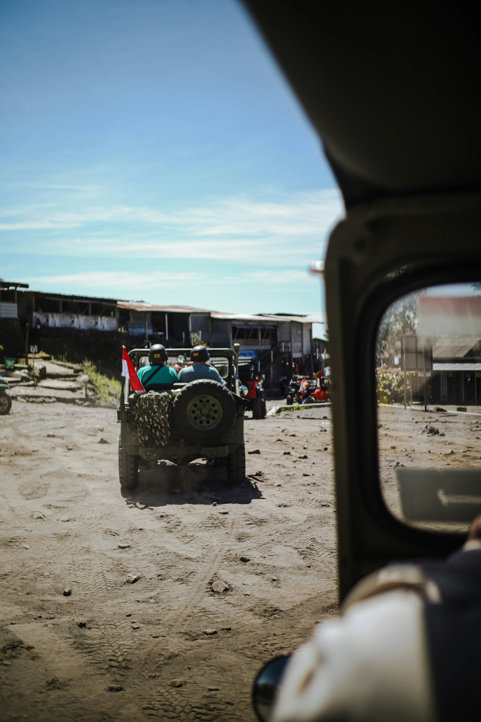 an image of a jeep being driven on the beach