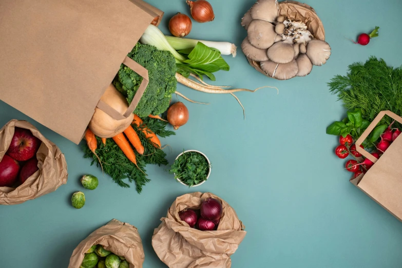 an assortment of vegetables are sitting on a table