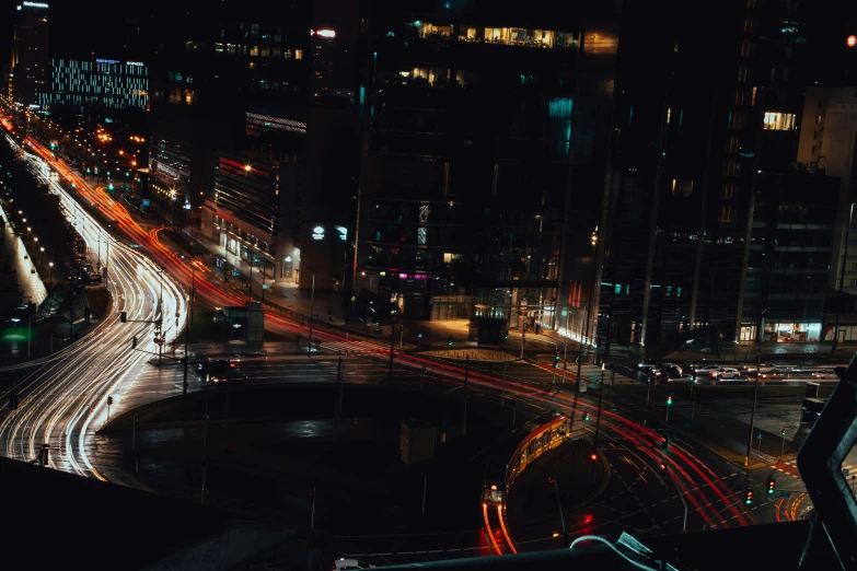 a nighttime po of an aerial view of highway intersection