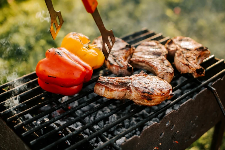 the food is being cooked on the grill