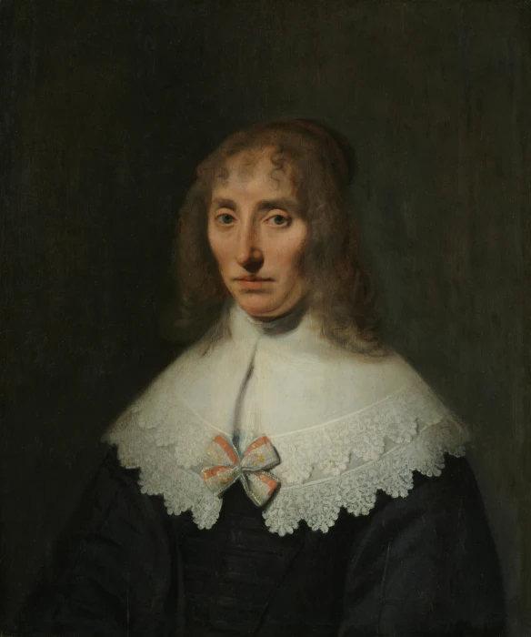 a portrait of a man wearing a black and white outfit