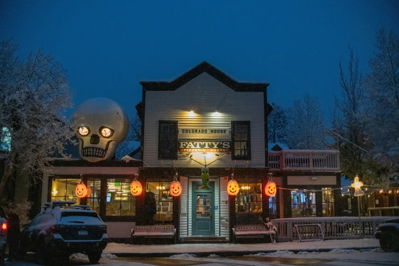 a store with a neon sign that reads dunkin donuts