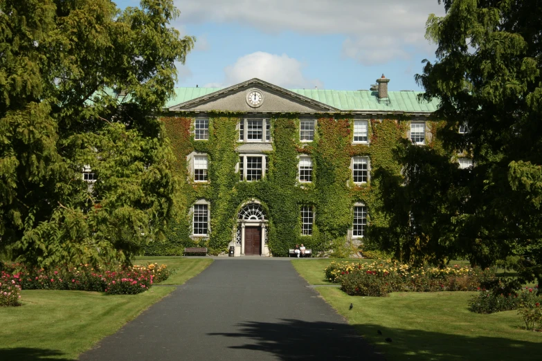 there is an old building covered in greenery