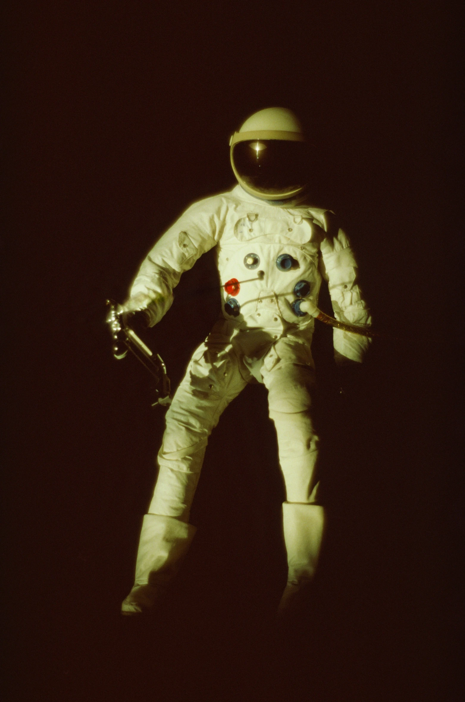 an image of an astronaut suit in the dark