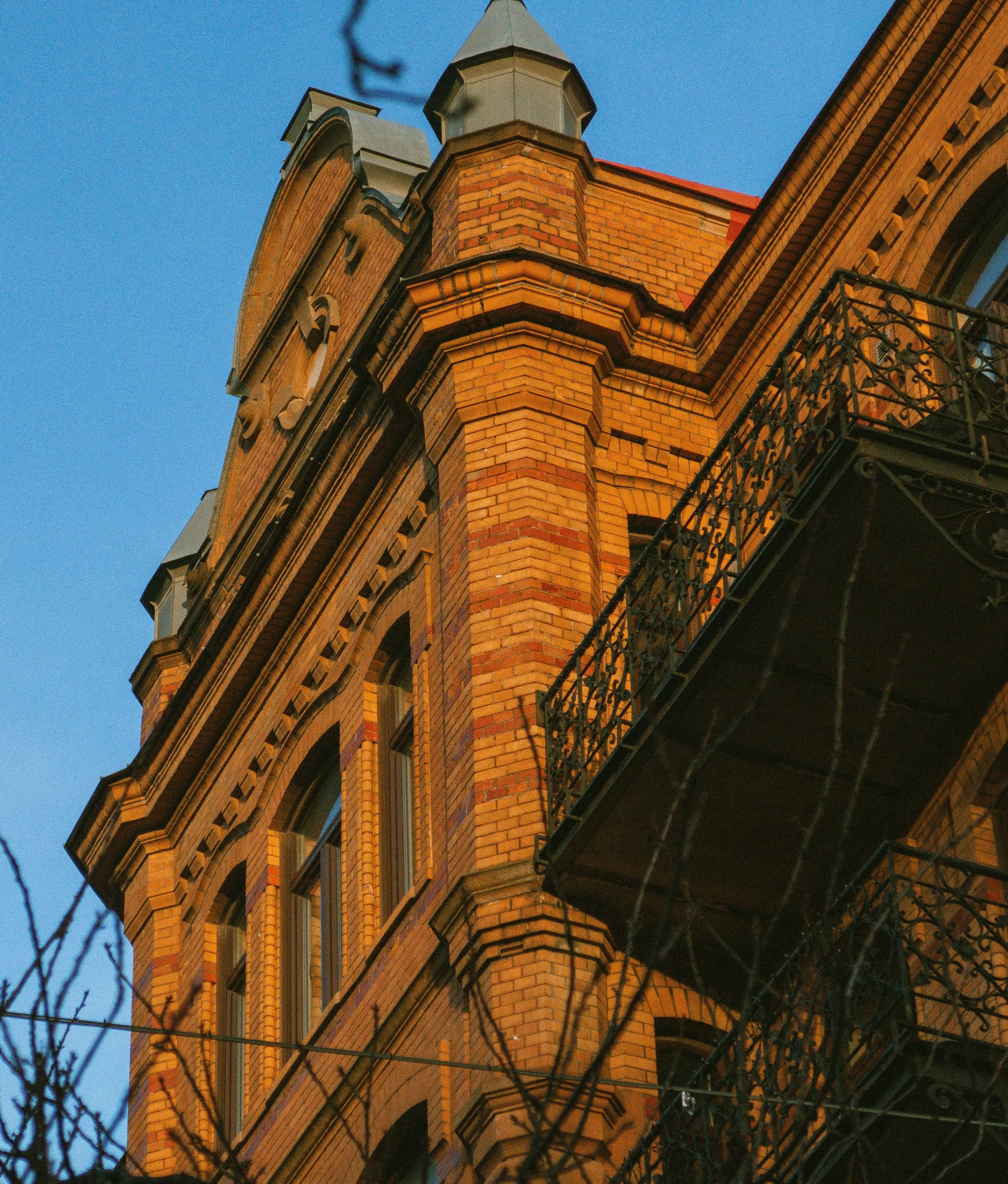 an old building and some iron balconies