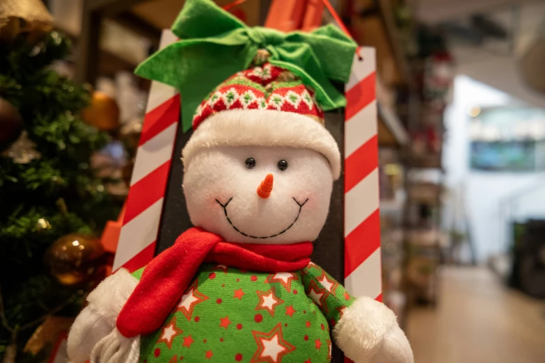 an assortment of holiday decorations sitting on a shelf