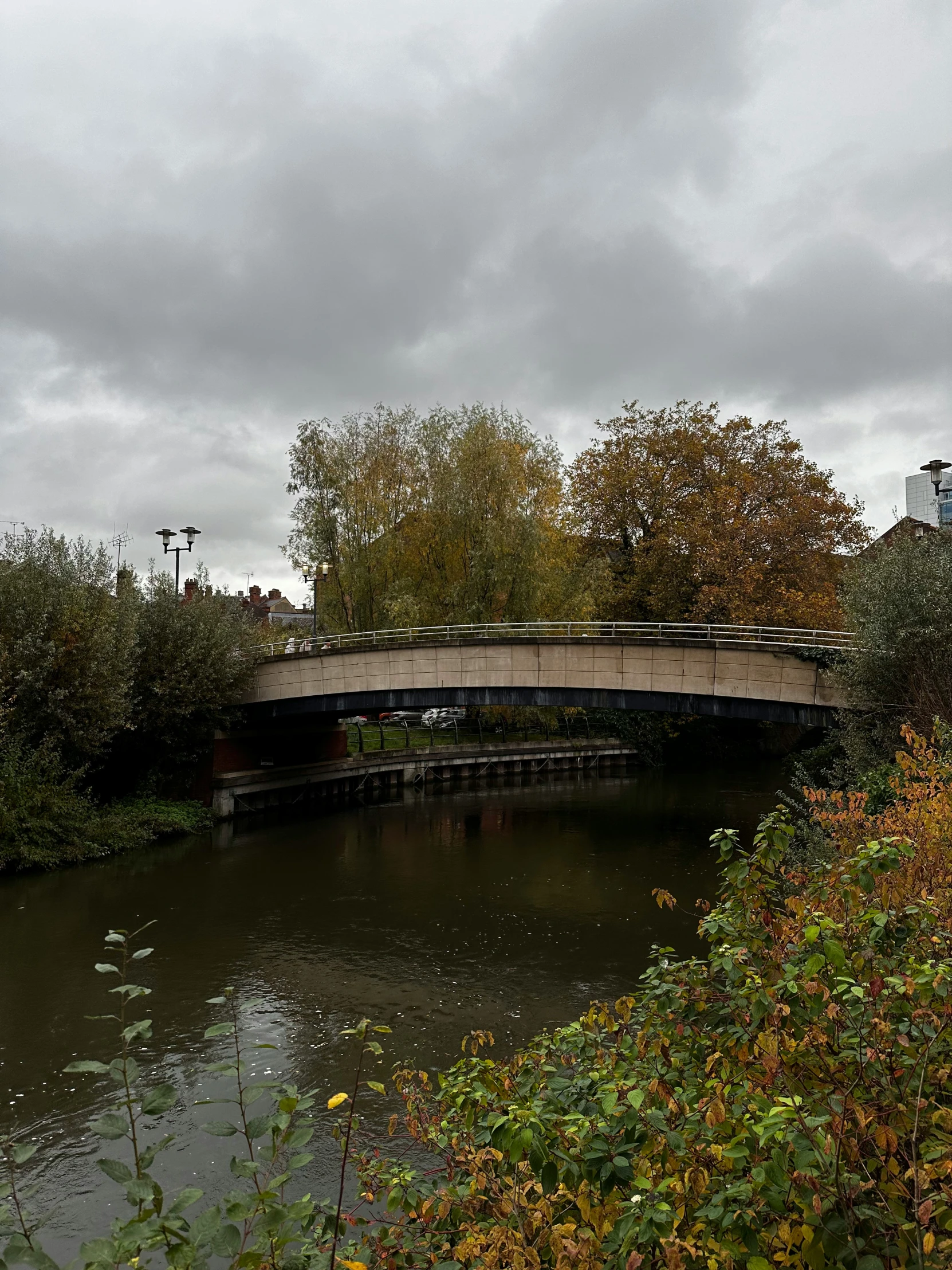 the street signs are clearly visible over the bridge