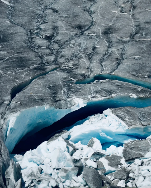 a glacier is in ice near some water