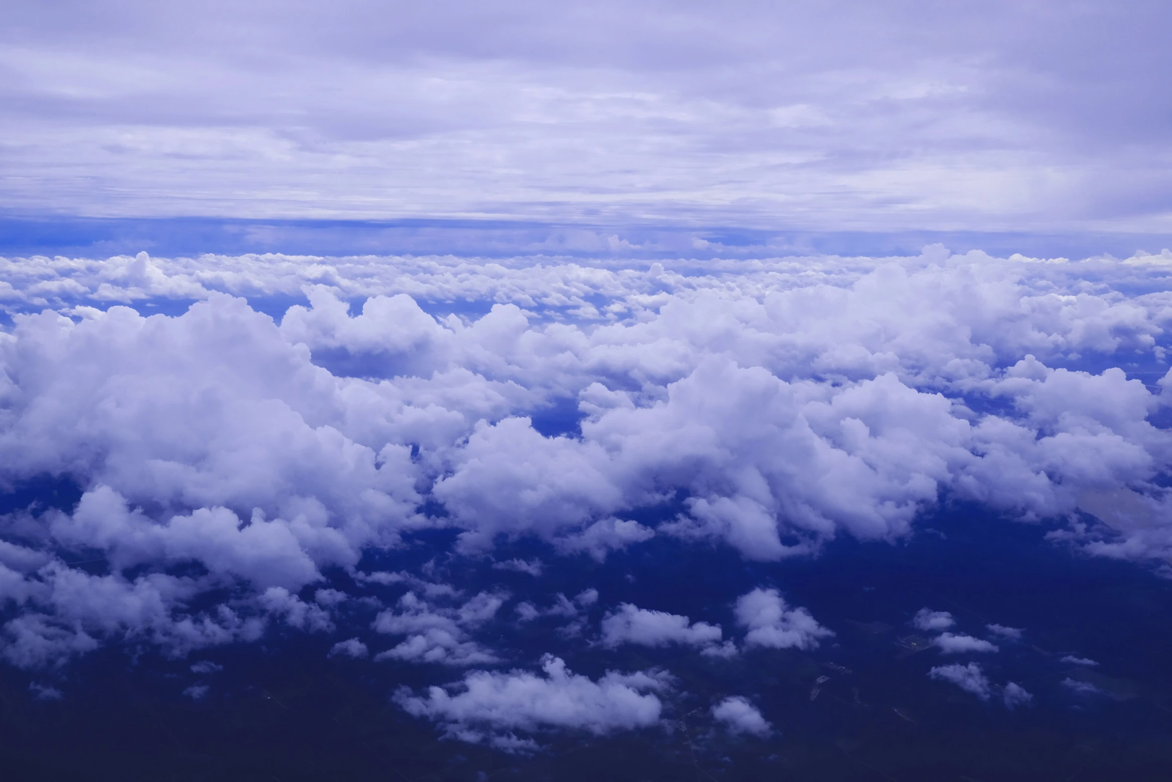 a very wide view of some clouds and some blue sky