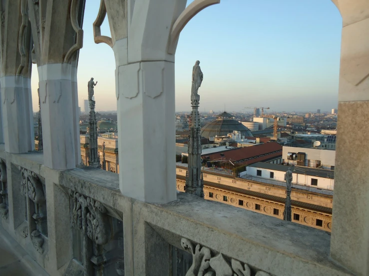 an elevated view of a city from inside a building