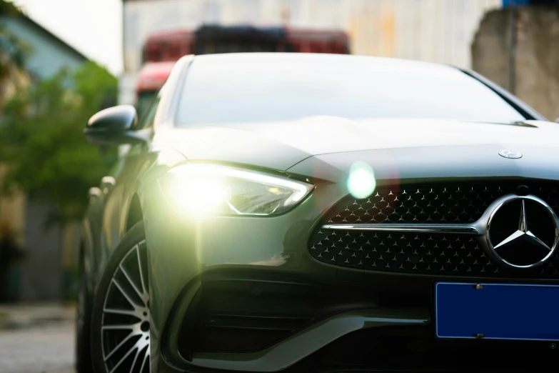 a mercedes - benz car is parked on the street