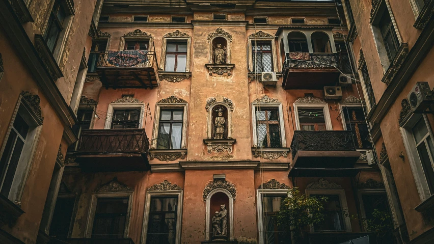 a building with balconyes in an old european city