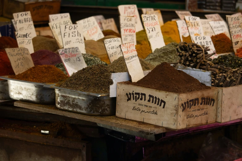 a display case full of different spices and food