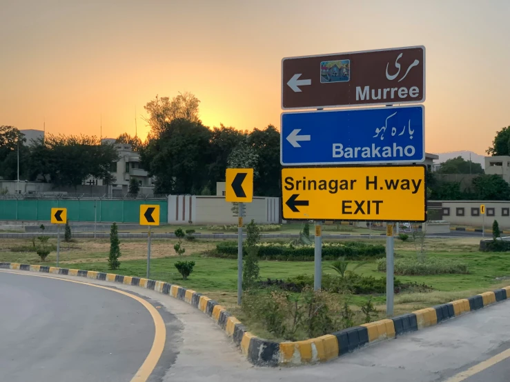 street signs in the middle of two streets