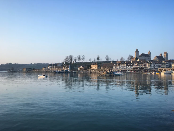 a city overlooking the water and a lot of houses