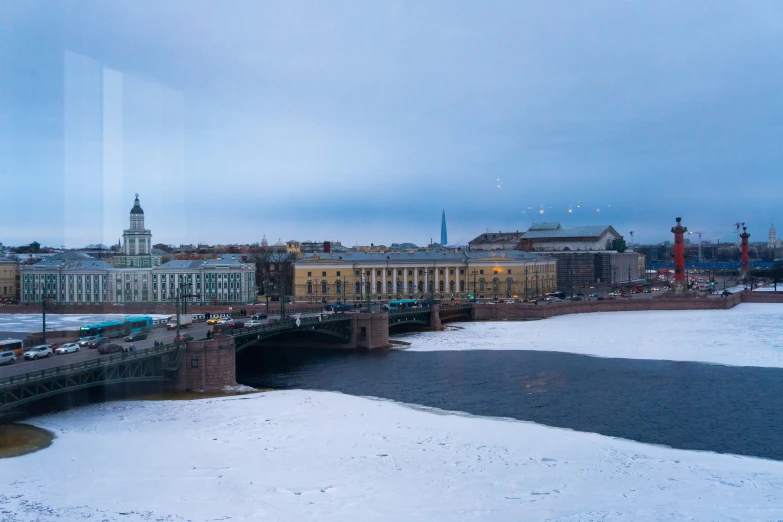 a city with buildings covered in snow