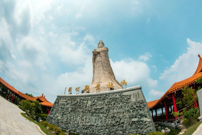 a picture of a pagoda from below with a clear sky