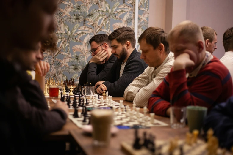 several men playing a game of chess